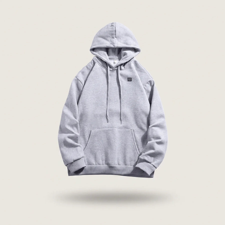 Heated hoodie in gray with hood, drawstrings and heat button on the chest