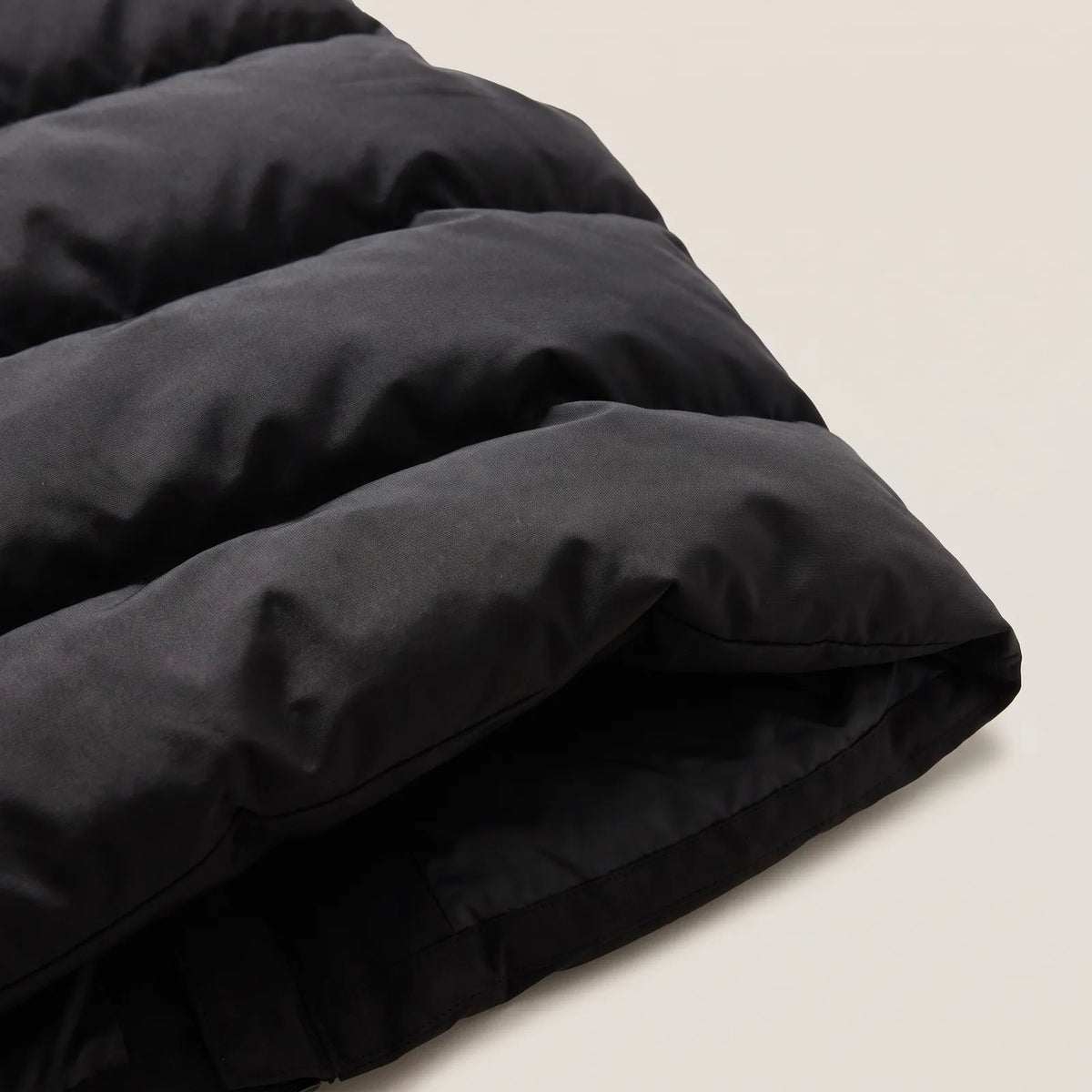 Close-up of the thick quilted padding of the heated vest 2.0
